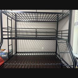 Triple bunk bed metal frame two twins sit on top of one full