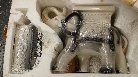 Italian porcelain elephant with trunk up