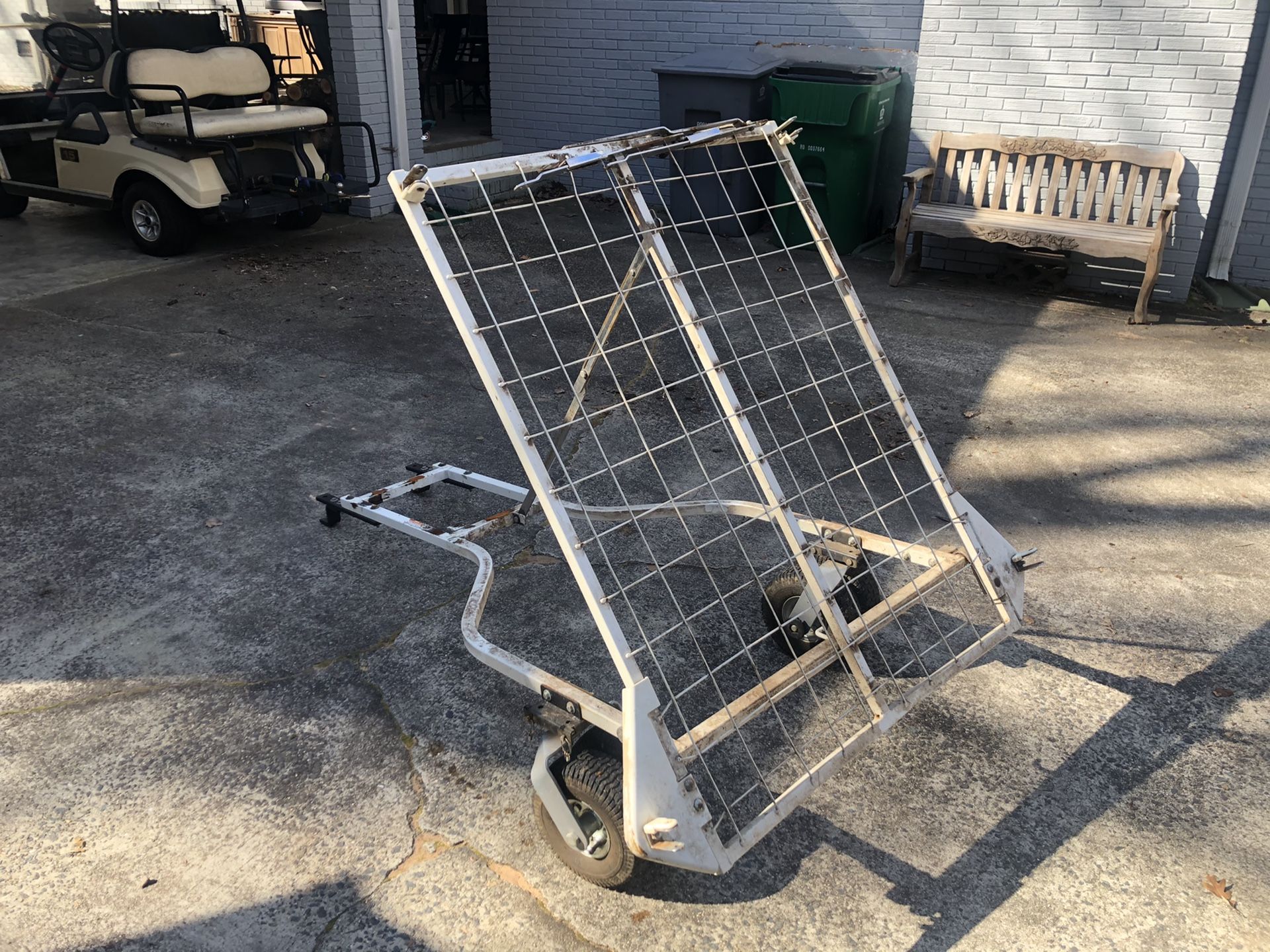 Cyclone Rake chassis - good condition. Could also be repurposed as a dump trailer for a lawn mower.