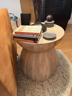 Round natural wood end table