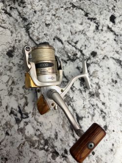 Shimano stradic 4000 spinning fishing reel spooled up with braid super smooth