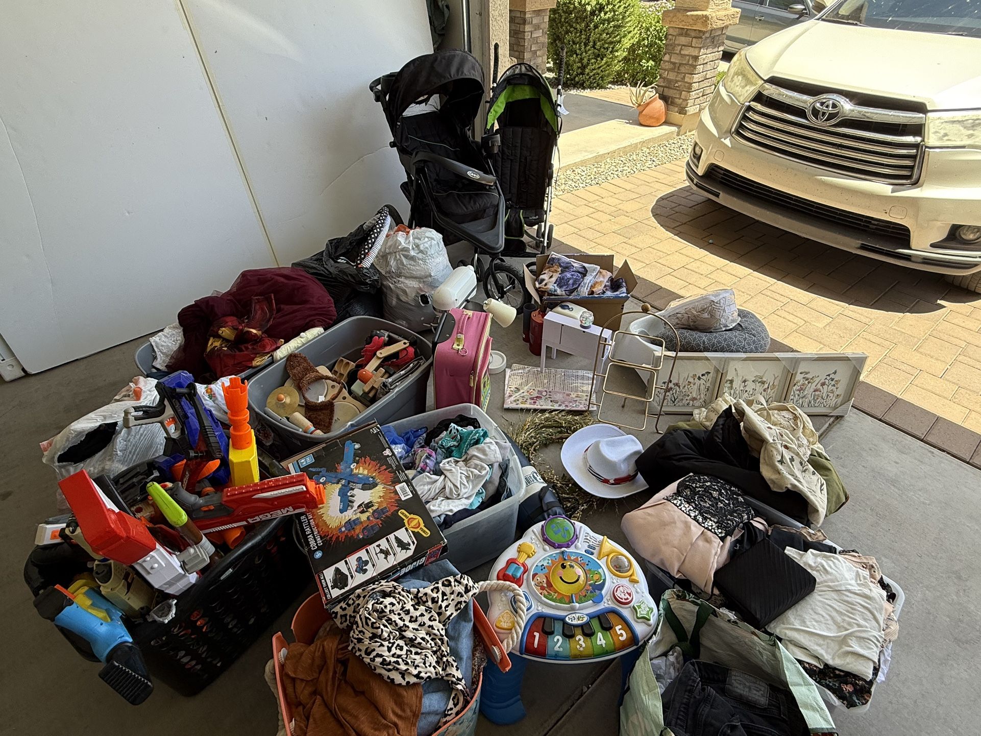 A huge Lot of Clothes, Nerf Guns And More