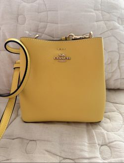 YELLOW COACH MINI TOWN BUCKET BAG