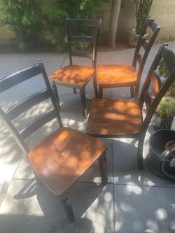 Four wooden chairs