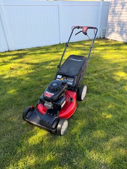 Self propelled lawn mower
