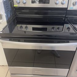 AMANA GLASS TOP STOVE STAINLESS STEEL