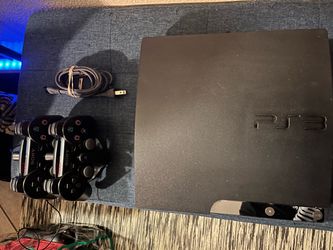 Sony PlayStation 3 Slim Console with Two Controllers
