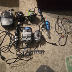 2 Air Pumps Aquarium Heater And A Water Pump