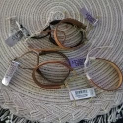 6 ASSORTED LEATHER ZODIAC BRACELETS
