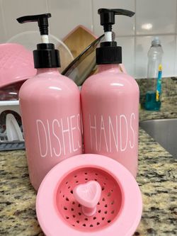 Pink soap dispensers