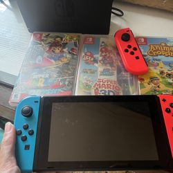 Nintendo Switch + Games 