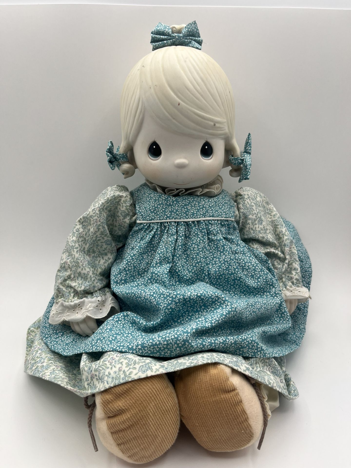 Precious Moment 1983 “Mother See Dear”. The Doll has a porcelain head & hands.