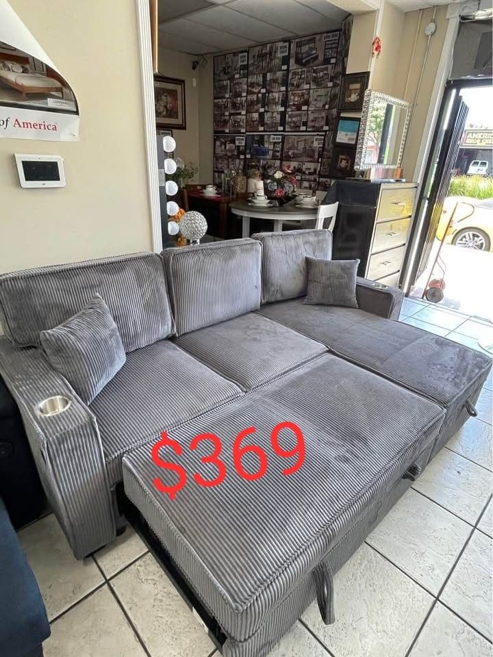 gray corduroy sectional sleeper sofa with storage chaise and pull out bed