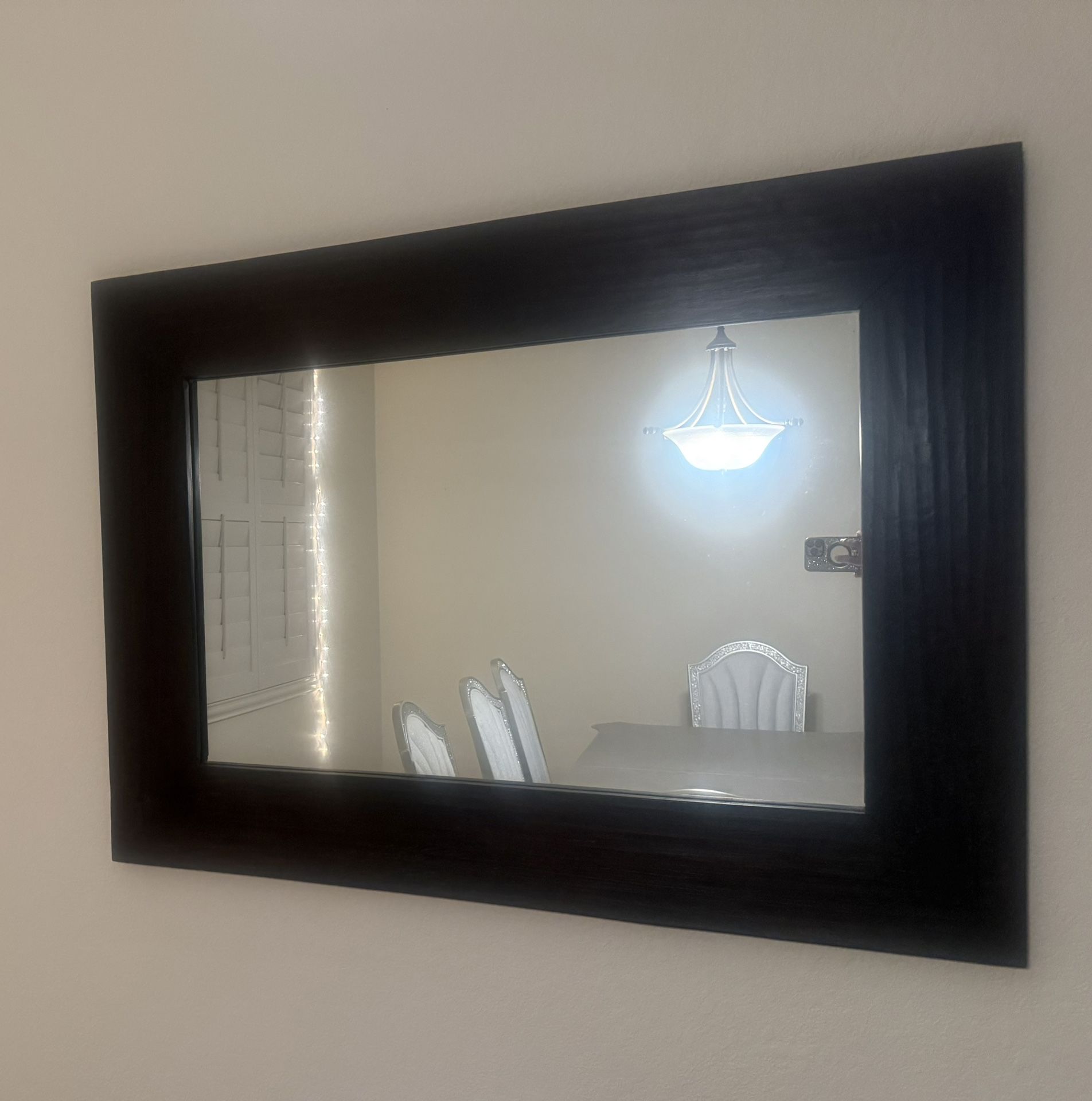 A large, heavy duty framed mirror O B O