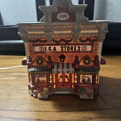 (L . G . A. STORE LIGHT & IS A 1926 HOUSE)