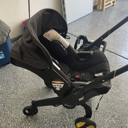 Doona Car Seat With Extras 