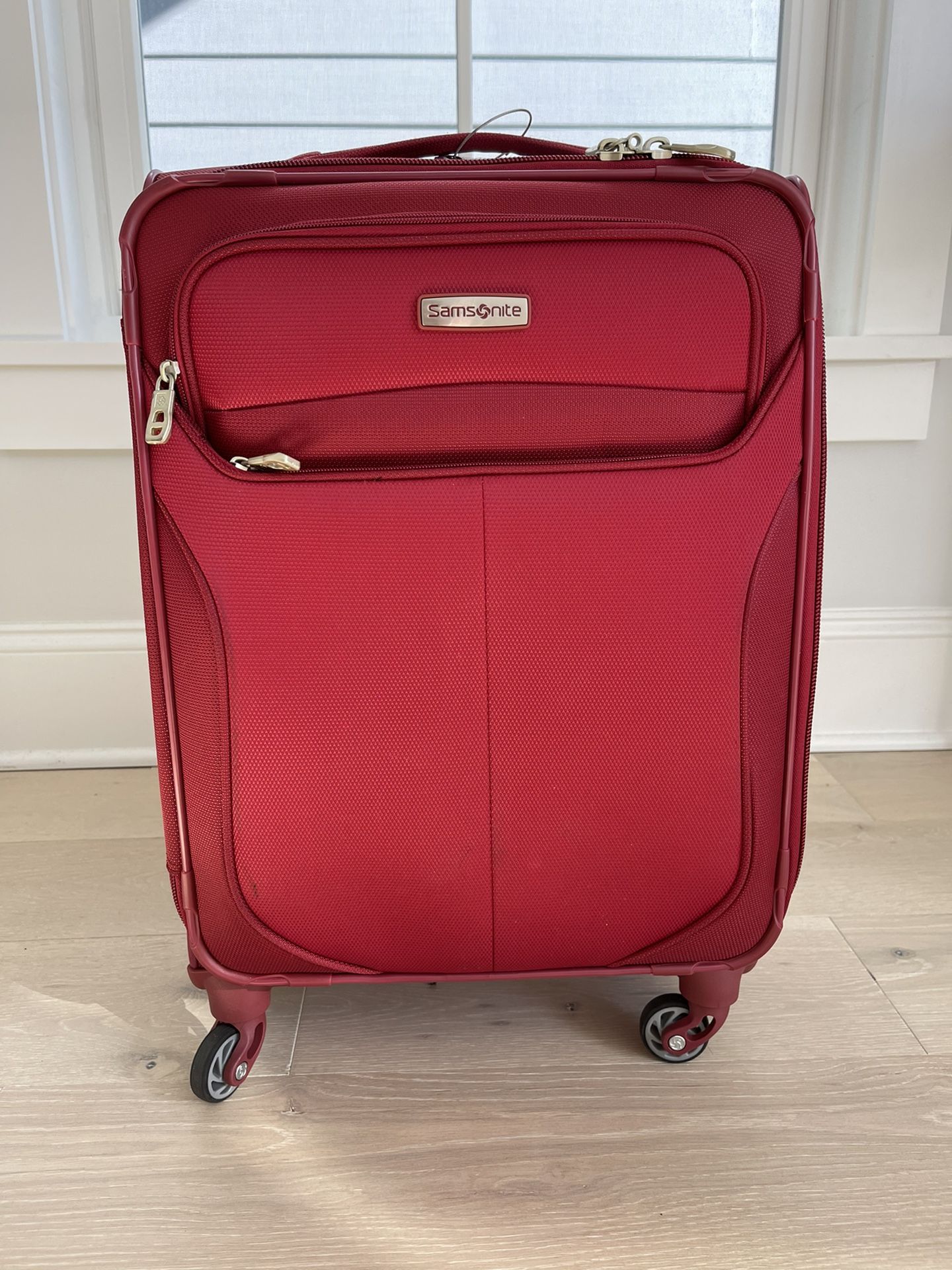 Red Samsonite 21” Spinner Carryon