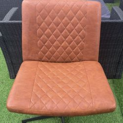 Brown Cognac Swivel Chair