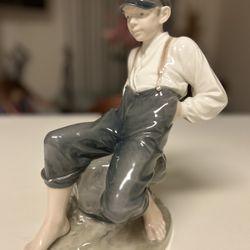 Royal Copenhagen Figurine- Boy On Rock #1659