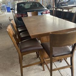 Real wood table with 8 Chairs 