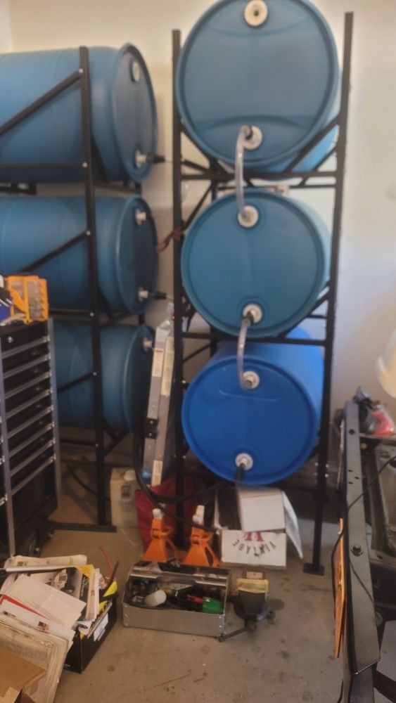Water Storage Racks And 50 Gallon Drums