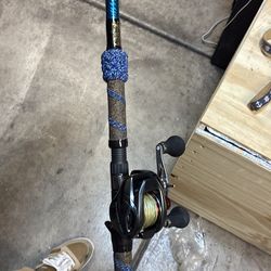Custom wrapped seeker 808 , 8ft. Rated 10 to 25 lb line paired with a 300 Shimano scorpion .