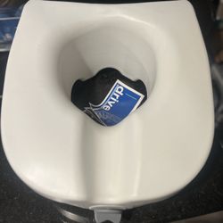 New Raised Toilet Seat