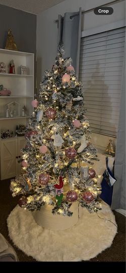 6ft pre lit Flocked Christmas tree ll