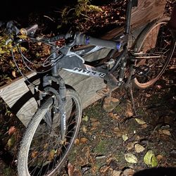 Hyper 26” Mountain Bike. Newer Pedal, Newer Grips, Fairly New (street) Tires. Needs New Brake Cable For Rear Brake Because It Got Crushed/bent 