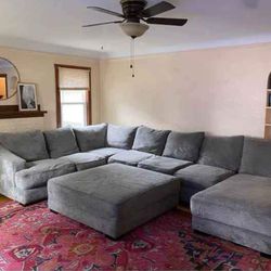 Gray sectional with ottoman