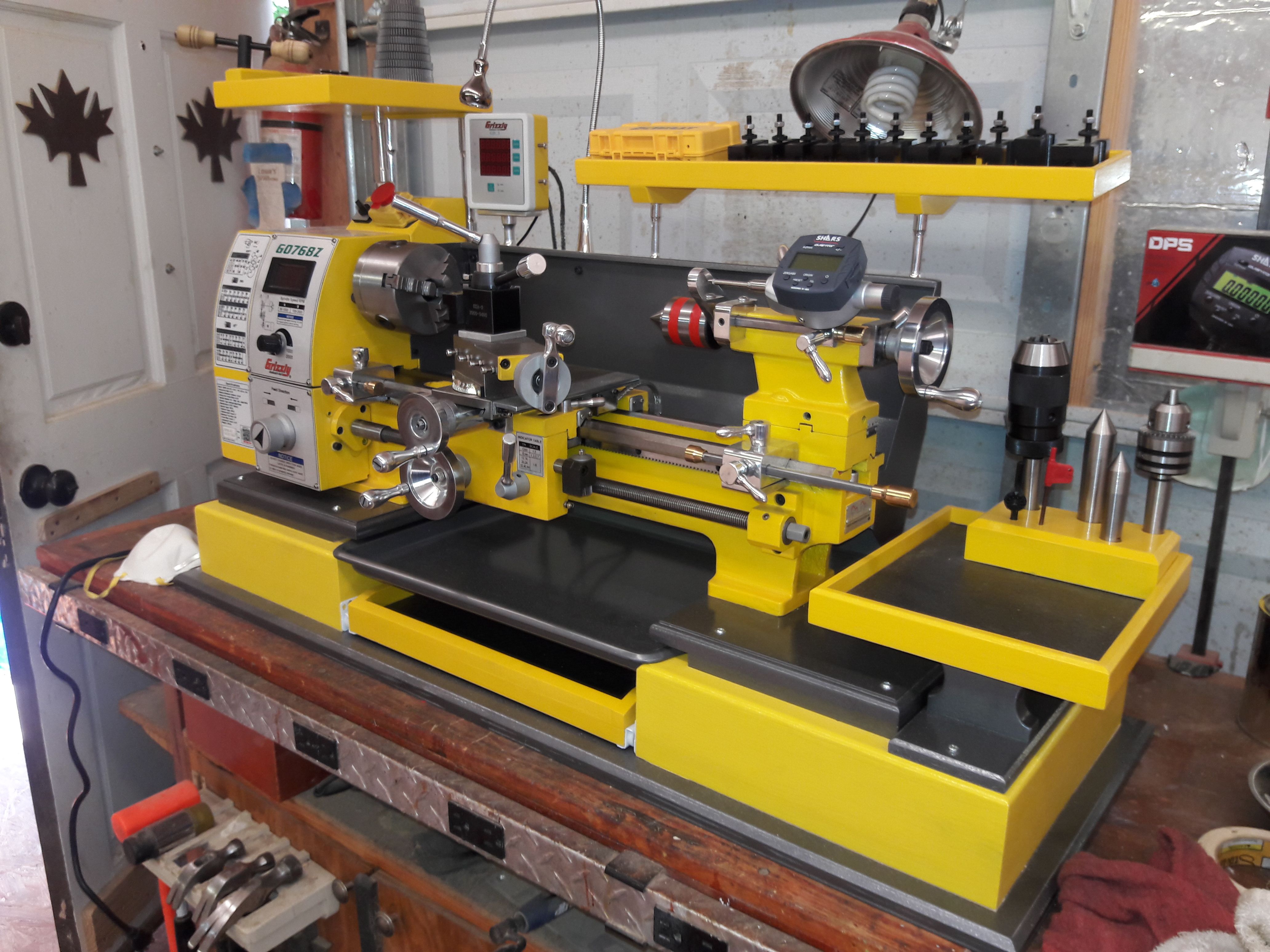 New grizzly g0768z with dro in all three axis. 8x16 variable speed lathe with lots of tooling.