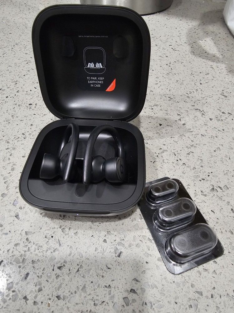 Beats by Dr Dre Powerbeats Pro Bluetooth Earbuds with charging case.