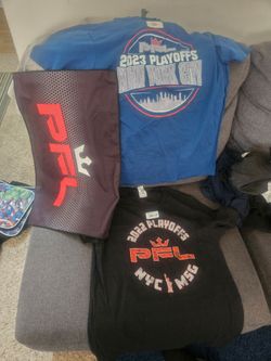 2 new size large shirts and flag