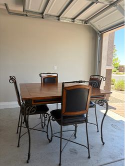 Dining table set, very sturdy and heavy. Comes with 4 chairs.