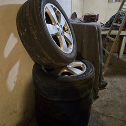 Mercedes Benz- 4 RIMS-with Tires On Them MAKE OFFER