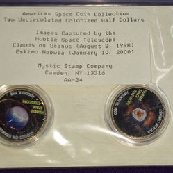 American Space Coin Collection" by Mystic Stamp Company. 
The coins feature images captured by the Hubble Space Telescope. 
One coin shows "Clouds on 
