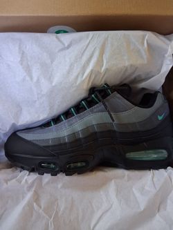 Nike Air Max 95 Big Bubble "Black Grape" in black and gray with layered panels, teal accents, and visible Air cushioning. US 9.5. The design includes