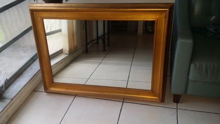 Nice wood frame with glass..perfect condition.