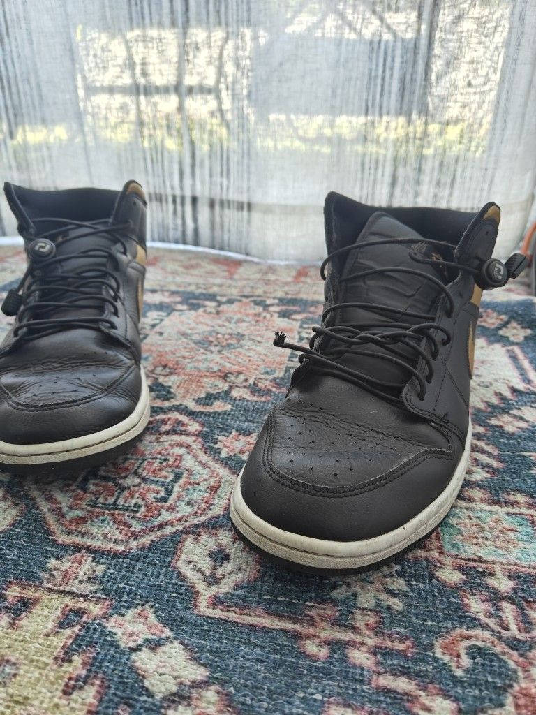 Black And Gold Jordan 1s