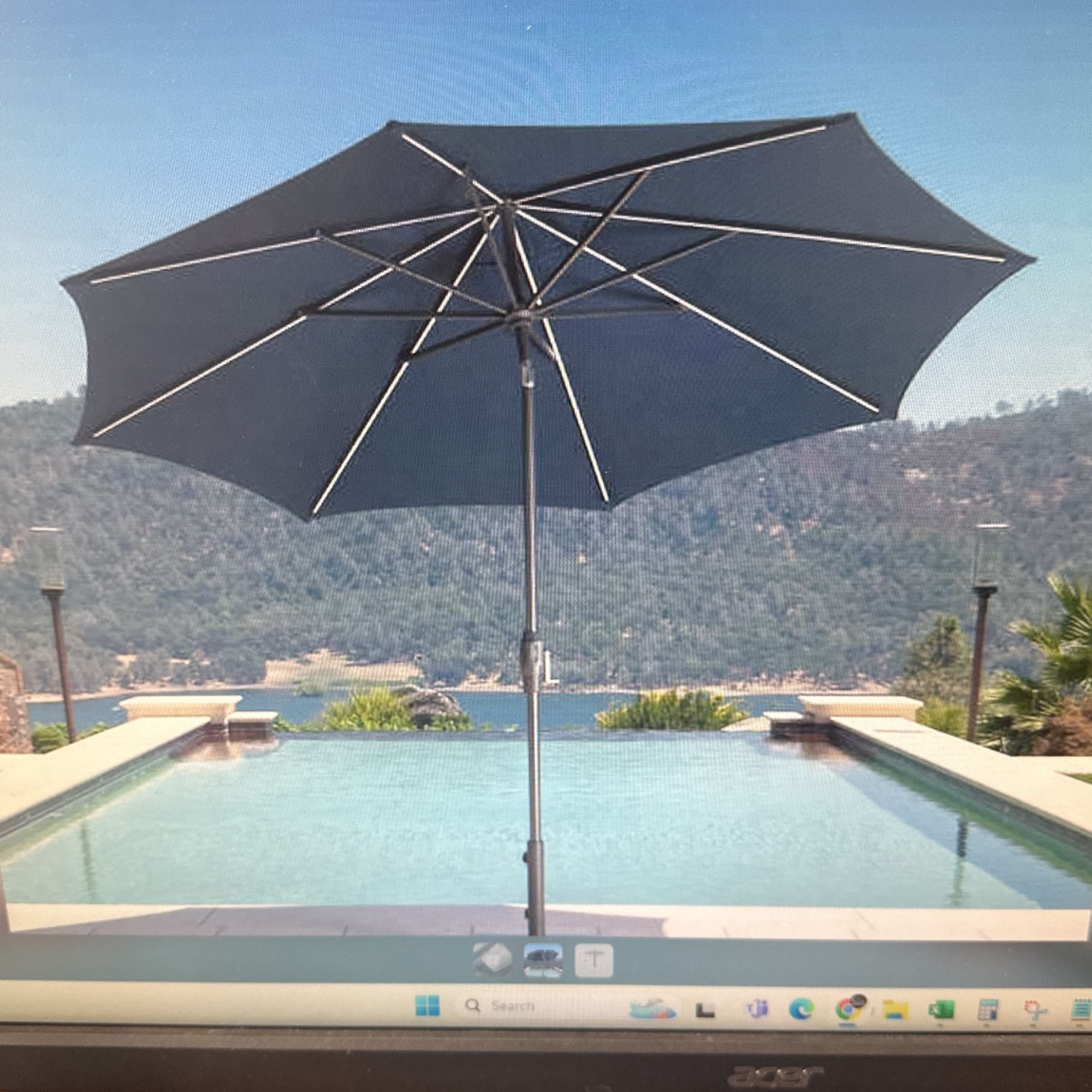 Sunvilla 10’ Round Solar LED Market Umbrella Blue for Sale in Lincoln