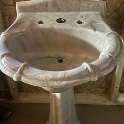 Pink Marble bathroom sink and shower pan