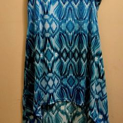Sun Dress with mid length front and long back. 