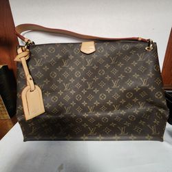 At Auction: Louis Vuitton, Louis Vuitton Graceful Handbag Luggage