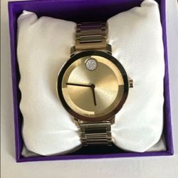 Ladies' Movado Bold Evolution Crystal Accent - Gold Tone, Retail 750 plus taxes