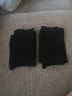 2 pairs, woman's black leggings. L-Xl
