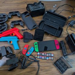 New Nintendo Switch OLED With Games & Installed Games All Resident Evils, Extra Controllers, Pistol Attachments, VR Headset & More Accessories.. Ect!.
