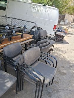 3folding tablespoons 2 other tables  and 13 chairs