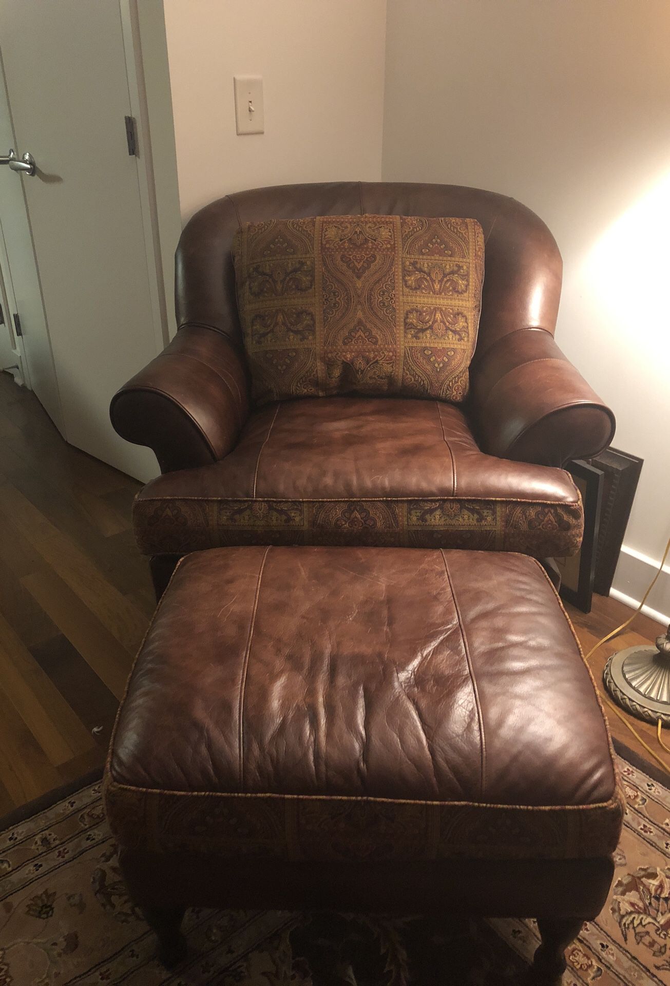 Thomasville leather chair and ottoman