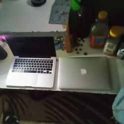 2 MacBook Laptops
