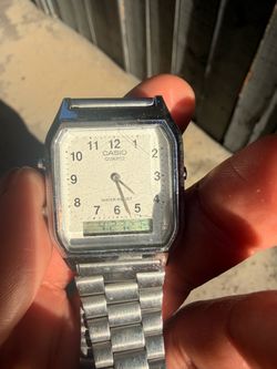 Casio wrist watch(vintage) AQ-230  mod 5154 analog / digital / dual time / stainless steel